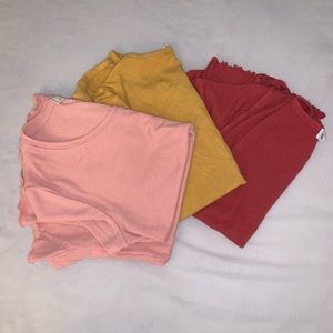 3 t shirts with ruffles on the end